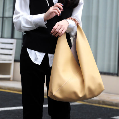 Spliced woven shoulder bag
